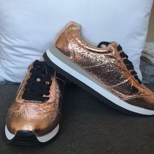 Rose gold and black sneakers
